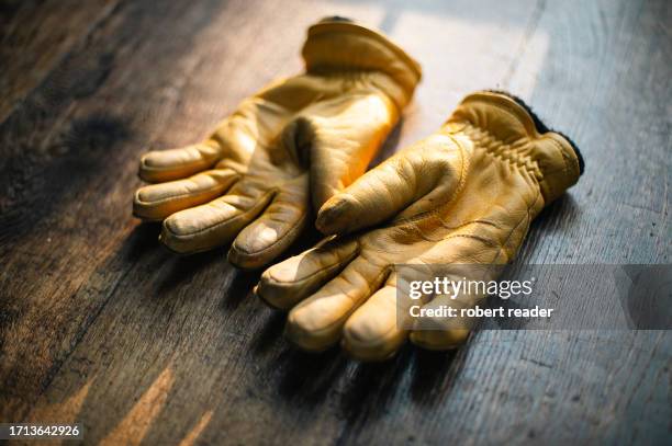 yellow leather work gloves - leather glove stock pictures, royalty-free photos & images