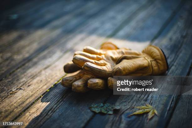 yellow leather work gloves - leather glove stock pictures, royalty-free photos & images