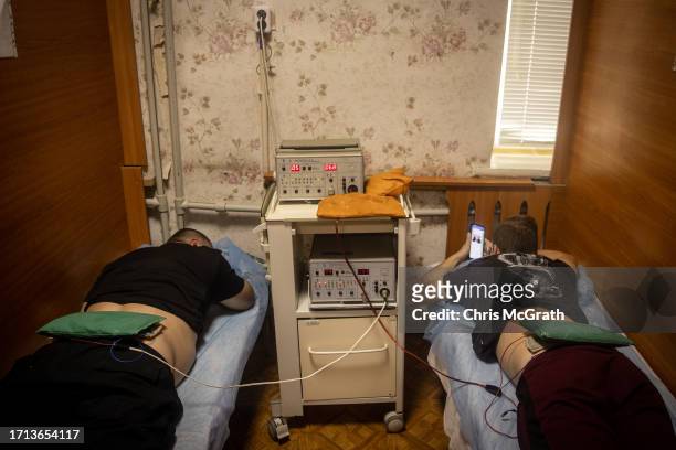 Soldiers use electronic and magnetic treatments at a rehabilitation center working with soldiers suffering from injuries and psychological trauma on...