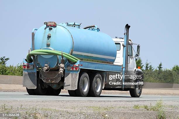 septic tank pump truck - septic tank pump truck stock pictures, royalty-free photos & images