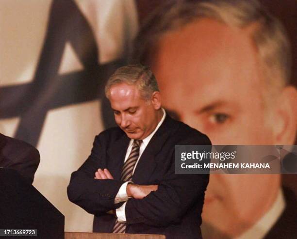Right-wing opposition leader Benjamin Netanyahu stands in silence after adressing his supporters at Likud headquarters in Tel Aviv 29 May. Netanyahu...