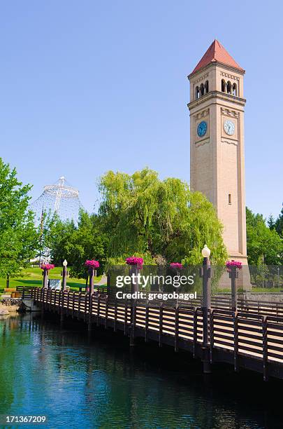 clock tower and bridge at riverfront park in spokane, wa - spokane stock pictures, royalty-free photos & images