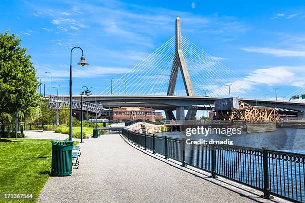 boston's northpoint park and zakim bridge - zakim bridge stock pictures, royalty-free photos & images