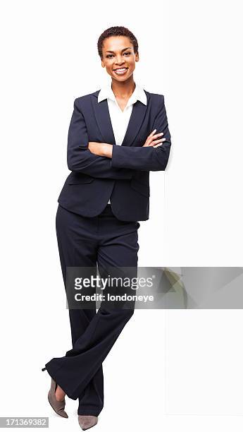 smart african american businesswoman standing with hands folded - leaning stock pictures, royalty-free photos & images