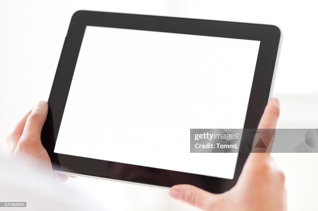 Hands Holding Tablet PC with Blank Screen