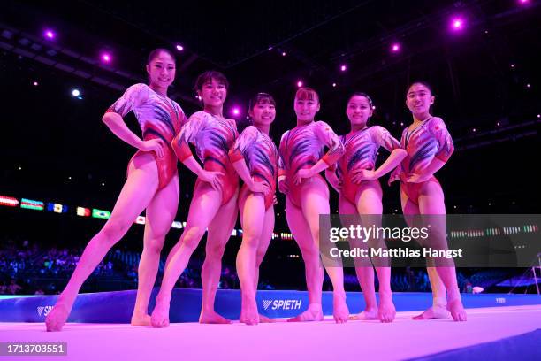 Members of Team Japan pose for a photograph during the Women's Qualifications on Day Three of the 2023 Artistic Gymnastics World Championships on...
