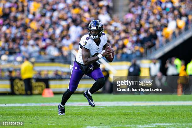 Baltimore Ravens quarterback Lamar Jackson looks to pass during the regular season NFL football game between the Baltimore Ravens and Pittsburgh...