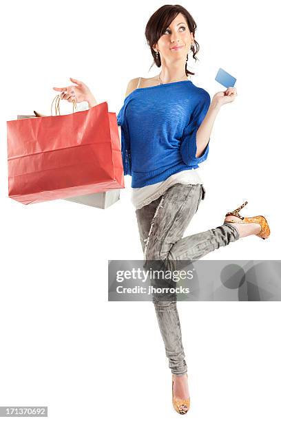 young woman with shopping bags and blank credit card - skinny jeans on white stock pictures, royalty-free photos & images