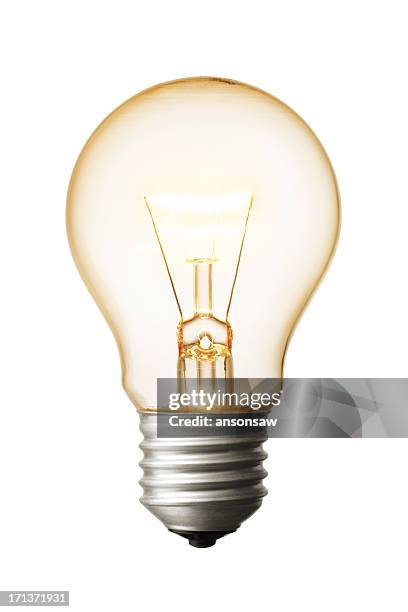 a close-up of a light bulb on a white background - light bulb stockfoto's en -beelden