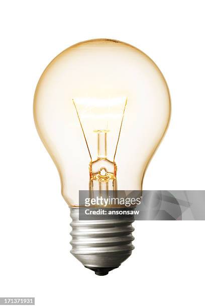 a close-up of a light bulb on a white background - light bulb stock pictures, royalty-free photos & images