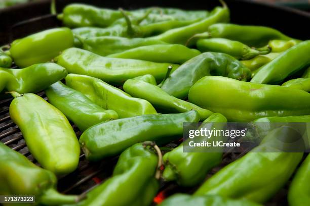 hatch chiles roasting over a fire - vehicle hatch stock pictures, royalty-free photos & images