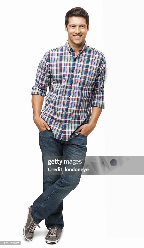 Young Man Standing With Hands In Pockets - Isolated