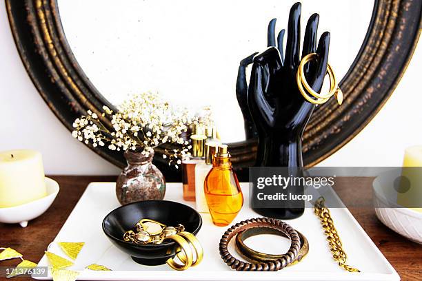 vanity dresser with fashion accessories, flowers and cosmetics - boureau stock pictures, royalty-free photos & images