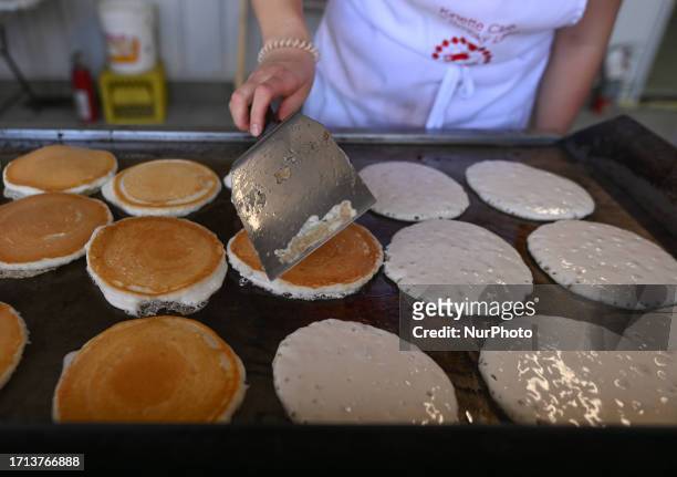 Pancake breakfast preparation on the 3rd day of the Smoky Lake Great White North Pumpkin Fair 2023, on October 7 in Smoky Lake, Alberta, Canada. The...