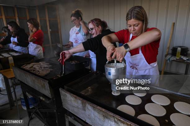 Pancake breakfast preparation on the 3rd day of the Smoky Lake Great White North Pumpkin Fair 2023, on October 7 in Smoky Lake, Alberta, Canada. The...