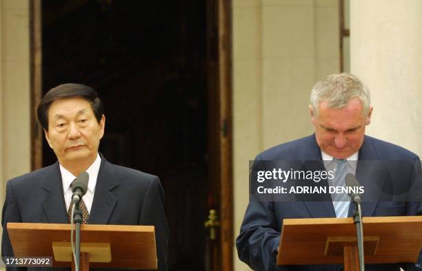 Zhu Rongji , Premier of the People's Republic of China, answers a question about human rights from a television journalist while Irish Taoiseach...