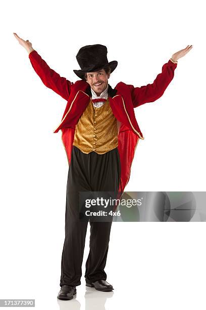 portrait of a ringmaster gesturing - ringmaster stock pictures, royalty-free photos & images