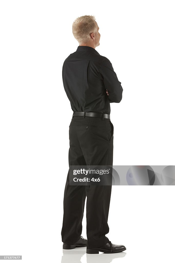 Businessman standing with his arms crossed