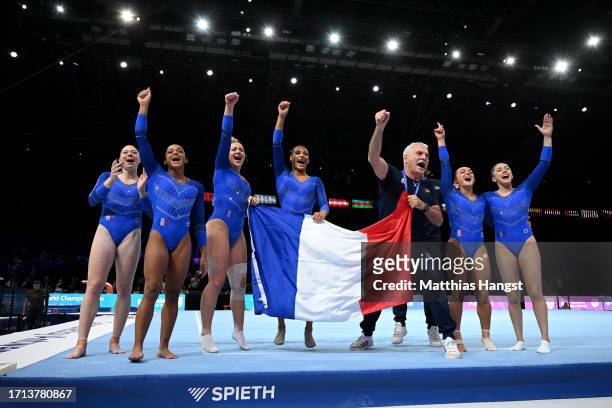 Team France celebrate during the Women's Qualifications on Day Three of the 2023 Artistic Gymnastics World Championships on October 02, 2023 in...