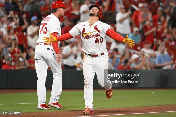 Willson Contreras of the St. Louis Cardinals reacts after hitting a home run against the Pittsburgh Pirates at Busch Stadium on September 1, 2023 in...