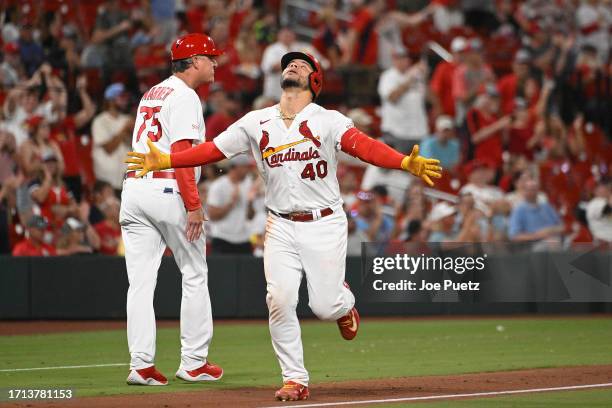 Willson Contreras of the St. Louis Cardinals reacts after hitting a home run against the Pittsburgh Pirates at Busch Stadium on September 1, 2023 in...