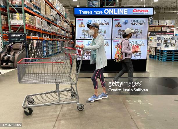 Customers shop at a Costco store on October 02, 2023 in San Francisco, California. According to a report by the Commerce Department, U.S. Consumer...
