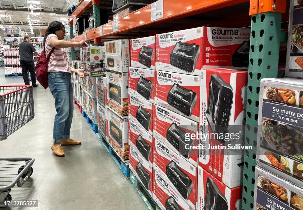 Customer shops at a Costco store on October 02, 2023 in San Francisco, California. According to a report by the Commerce Department, U.S. Consumer...