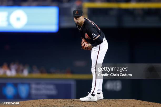 Justin Martinez of the Arizona Diamondbacks pitches against the Houston Astros during the game at Chase Field on October 01, 2023 in Phoenix,...