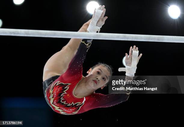 Qiyuan Qiu of Team China competes on Uneven Bars during the Women's Qualifications on Day Three of the 2023 Artistic Gymnastics World Championships...