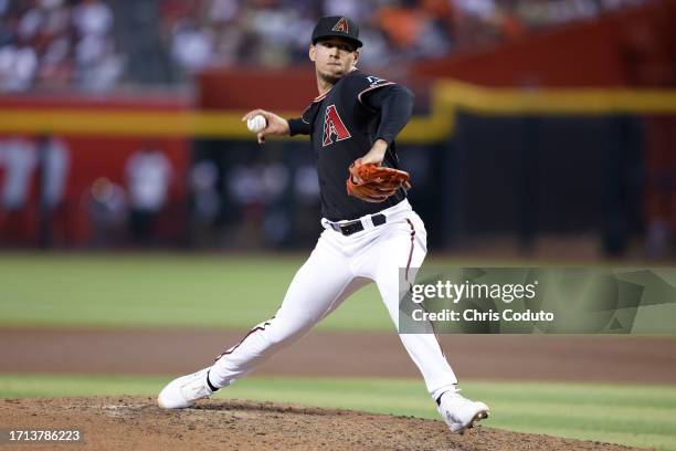 Justin Martinez of the Arizona Diamondbacks pitches against the Houston Astros during the game at Chase Field on October 01, 2023 in Phoenix,...