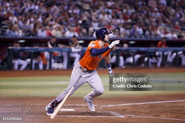 Kyle Tucker of the Houston Astros runs to first base after hitting a ground rule double during the seventh inning against the Arizona Diamondbacks at...