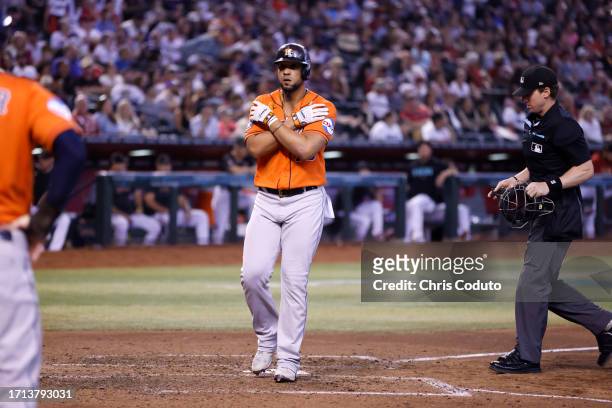 Jose Abreu of the Houston Astros reacts after hitting a two run home run during the seventh inning against the Arizona Diamondbacks at Chase Field on...