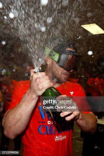 Alex Bregman of the Houston Astros celebrates after the Astros defeated the Arizona Diamondbacks 8-1 to win the American League West division title...