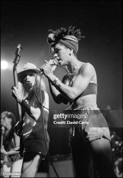 Jennie Matthias and Lesley Shone on bass guitar of The Belle Stars performing at The Lyceum Theatre, London, UK on 25 July 1982.