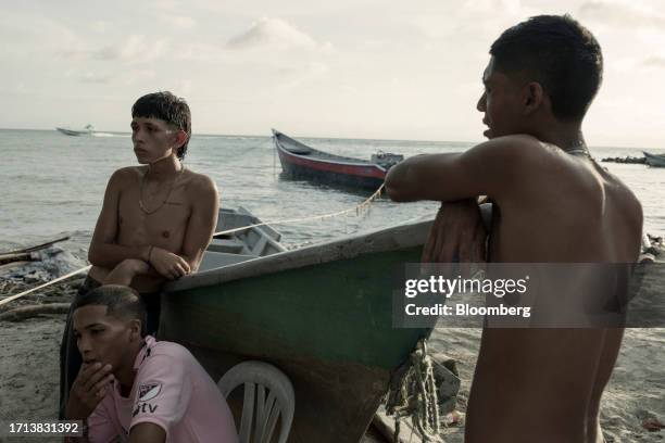 Migrants on a beach in Necocli, Antioquia department, Colombia, on Saturday, Oct. 7, 2023. The number of migrants trying to reach the US border by...