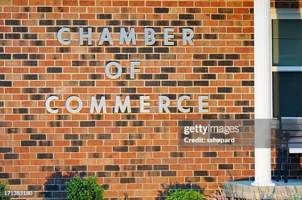chamber of commerce sign on building - chamber of commerce stock pictures, royalty-free photos & images
