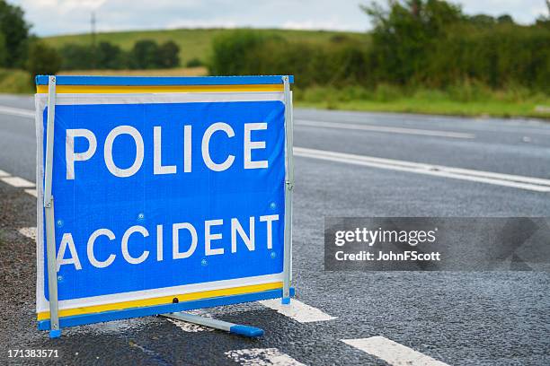 british police accident sign at the side of the road. - police scotland stock pictures, royalty-free photos & images