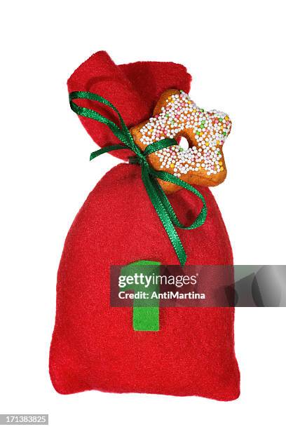 red christmas bag for advent calendar isolated on white - adventkalender stock pictures, royalty-free photos & images