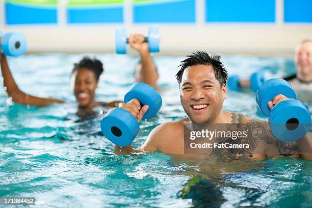 water aerobics group - aquagym stock pictures, royalty-free photos & images