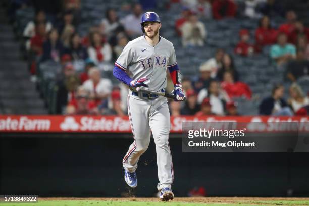 Jonah Heim of the Texas Rangers walks in the eighth inning against the Los Angeles Angels at Angel Stadium of Anaheim on September 25, 2023 in...