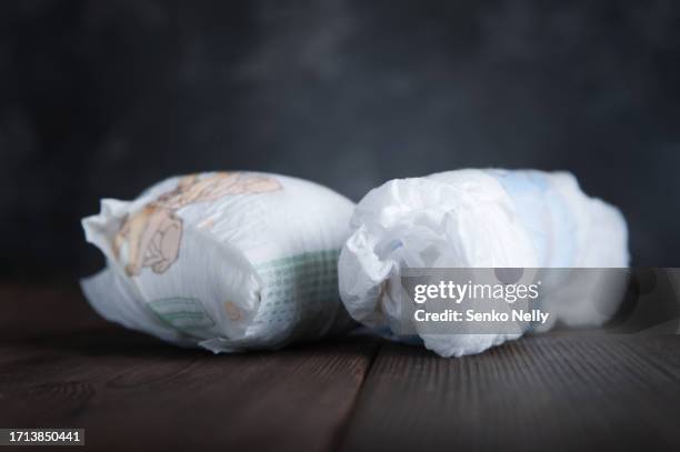 used dirty diapers. recycling baby diapers, environmental issues - diaper stock pictures, royalty-free photos & images