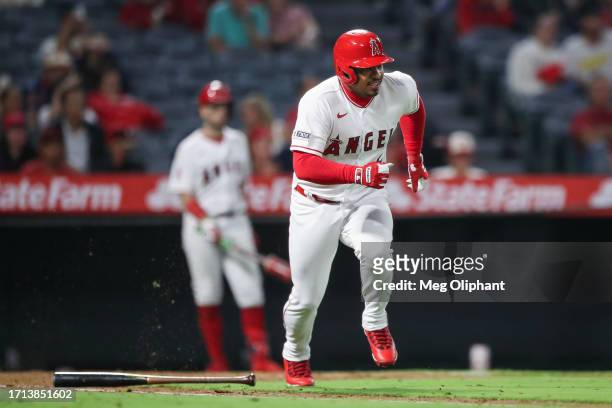 Eduardo Escobar of the Los Angeles Angels watches his hit in the seventh inning against the Texas Rangers at Angel Stadium of Anaheim on September...