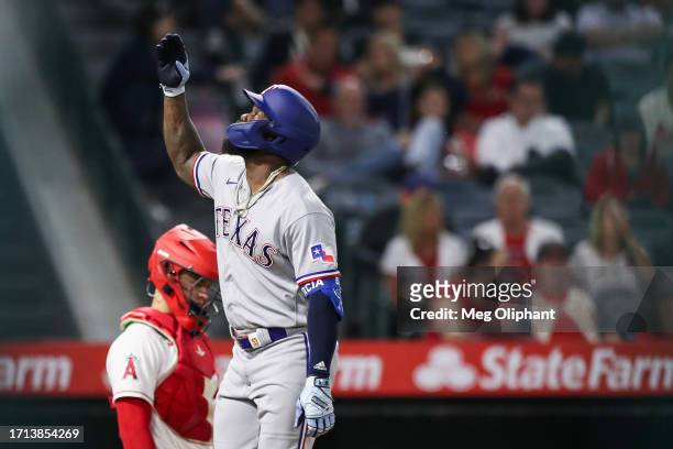 Adolis Garcia of the Texas Rangers celebrates his home run in the sixth inning against the Los Angeles Angels at Angel Stadium of Anaheim on...