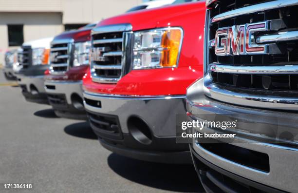 gm trucks at dealership - gm stock pictures, royalty-free photos & images