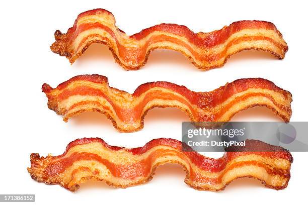 three bacon slices on white background - bacon isolated stock pictures, royalty-free photos & images