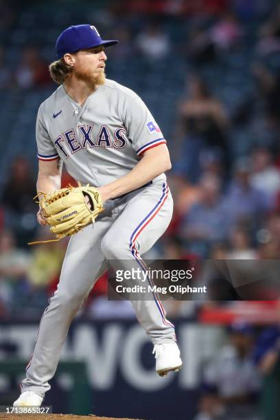 Jon Gray of the Texas Rangers pitches in the first inning against the Los Angeles Angels at Angel Stadium of Anaheim on September 25, 2023 in...