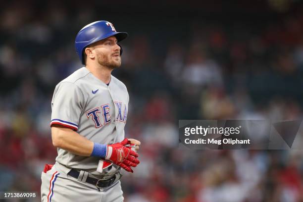Robbie Grossman of the Texas Rangers walks in the first inning against the Los Angeles Angels at Angel Stadium of Anaheim on September 25, 2023 in...