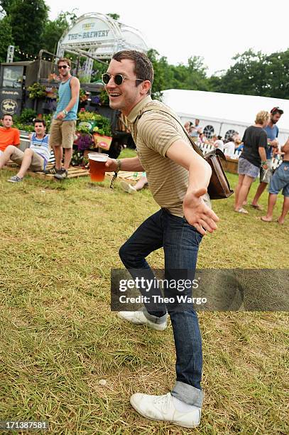 Elijah Wood hangs out at The Brewery at the Firefly Music Festival at The Woodlands of Dover International Speedway on June 23, 2013 in Dover,...