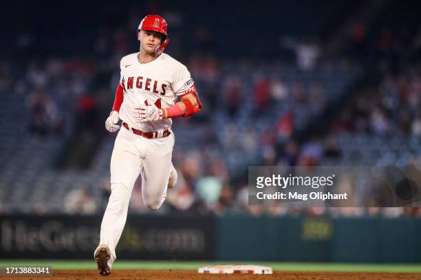Logan O'Hoppe of the Los Angeles Angels scores a home run in the second inning against the Texas Rangers at Angel Stadium of Anaheim on September 25,...