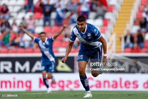 Guillermo MartInez of Puebla celebrates after scoring the team's first goal during the 12th round match between Necaxa and Puebla as part of the...